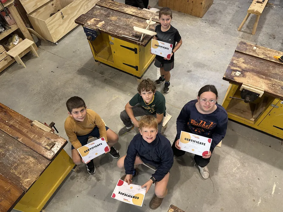 Students in the studio, proud of their work